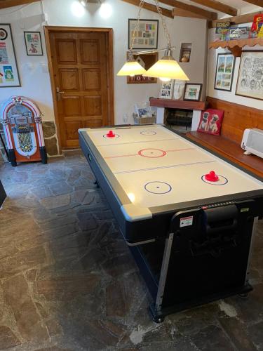 a ping pong table in a room at Angliiska Vila in Arbanasi