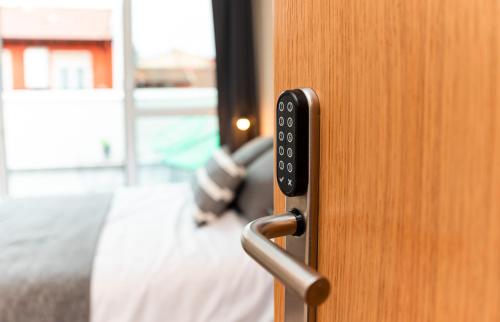 Katil atau katil-katil dalam bilik di Apartamentos Kai