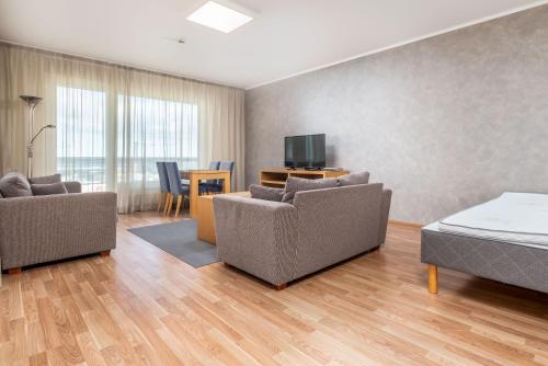 Televisyen dan/atau pusat hiburan di Adelle Apartments Viru Keskuses, 9-th floor