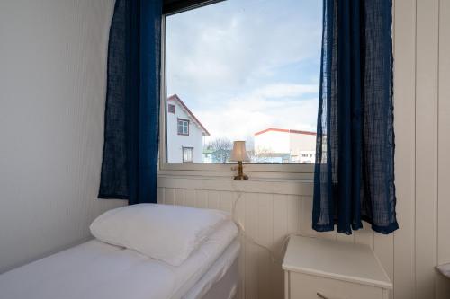 Katil atau katil-katil dalam bilik di Apt 101 - Andenes Whale Safari Apartments