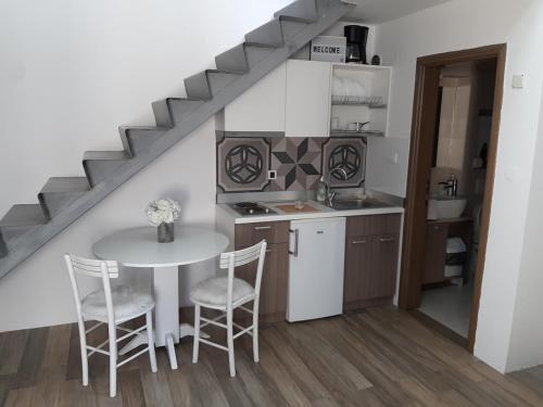 A cozinha ou cozinha compacta de Centar Novi Sad-Apartman No 3