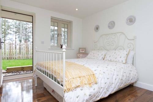 Postel nebo postele na pokoji v ubytování Breckland Cottage - Secluded Country Getaway