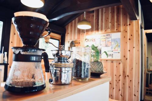 a blender sitting on top of a counter at Habuman Okinawa in Kunigami