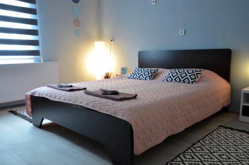 Postel nebo postele na pokoji v ubytování Kizde