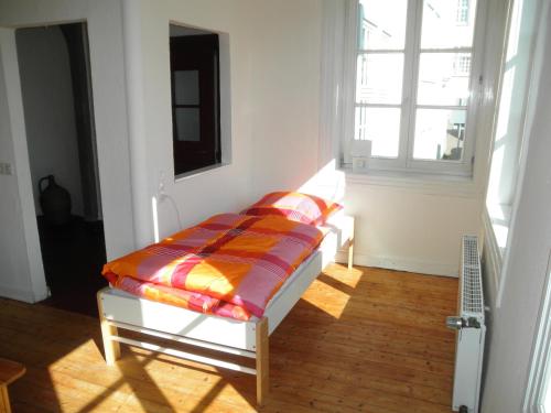 Tempat tidur dalam kamar di Altstadthaus