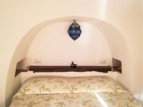 Ένα ή περισσότερα κρεβάτια σε δωμάτιο στο Marulivo Hotel