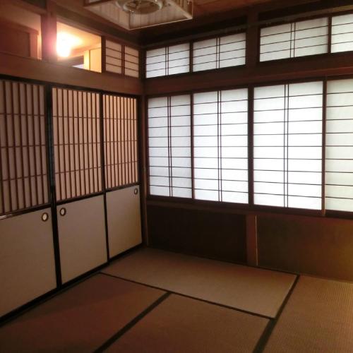 a room with doors and windows in a building at Takayama Ninja House in Takayama