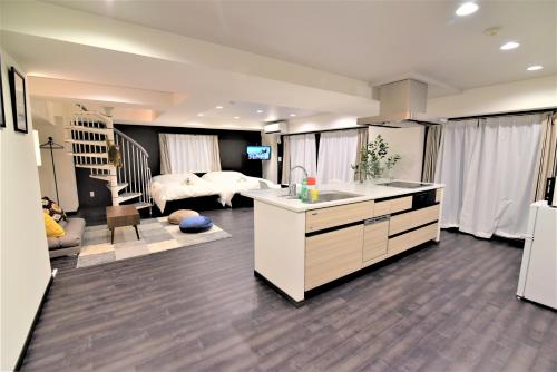 Postel nebo postele na pokoji v ubytování Hotel Central Yokohama