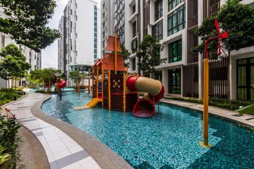 a playground in the middle of a city at H20 Residence Ara Damansara by Airhost in Petaling Jaya