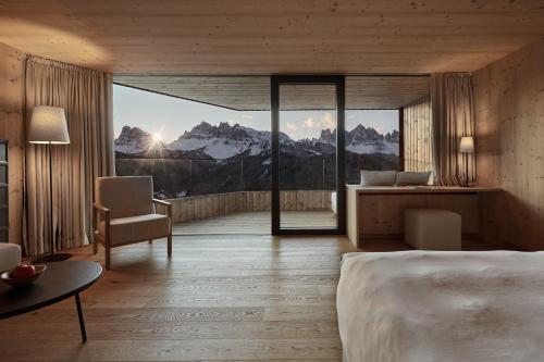 Posteľ alebo postele v izbe v ubytovaní Forestis Dolomites