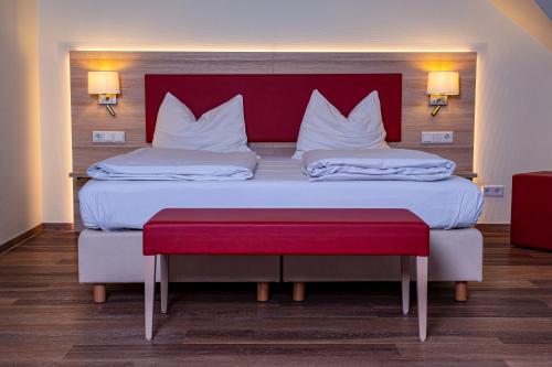 Katil atau katil-katil dalam bilik di Hotel am Stadtpark