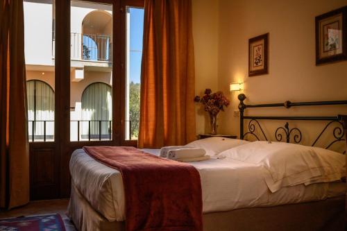 En eller flere senger på et rom på B&B Villa Giulia