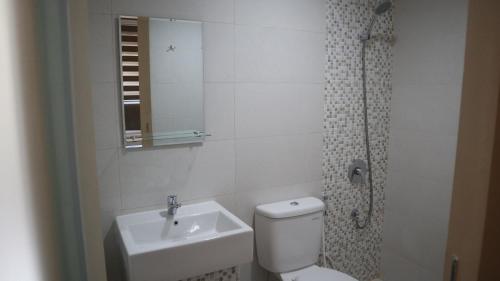 Koupelna v ubytování DJURAGAN KAMAR SLIPI