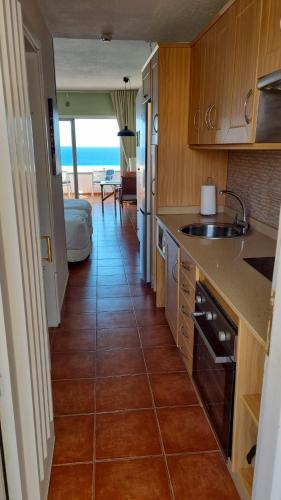 Kuchyň nebo kuchyňský kout v ubytování Vv casafaromar oceanfront comfort
