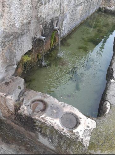 a water hole with water coming out of it at CA LIDIA - Apartamentos Turisticos EL BALCONET in Benimantell