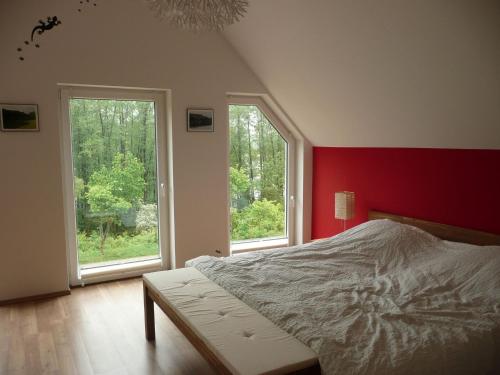 Ein Bett oder Betten in einem Zimmer der Unterkunft Lakeside House Strasen