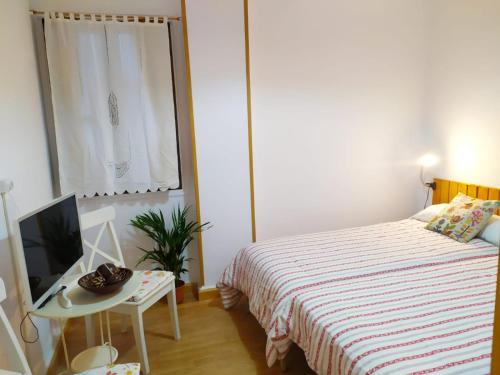 Cama o camas de una habitación en Apartamento Ponsferrata