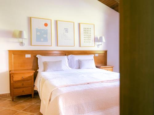 Postel nebo postele na pokoji v ubytování Agriturismo La Valle Di Vico