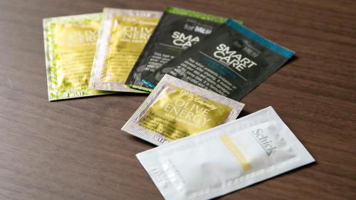 three different types of food wrappers on a table at KOKO HOTEL Hidatakayama - formaly Hotel Wing Hida Takayama in Takayama