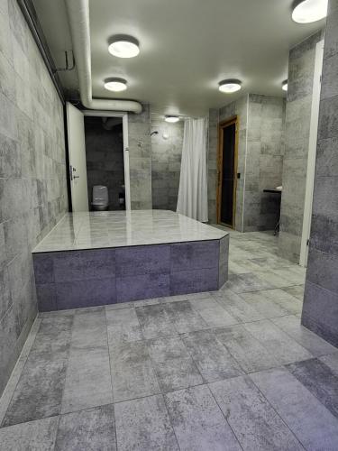 a bathroom with a marble counter in a room at Best Western Hotel Royal in Malmö