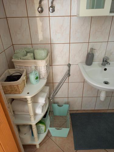 Koupelna v ubytování Dűlő Apartmanház