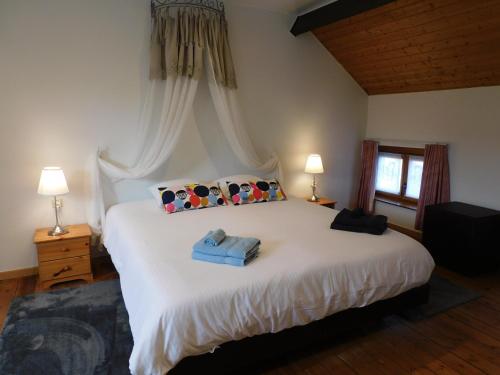 Tempat tidur dalam kamar di Kruitenberg