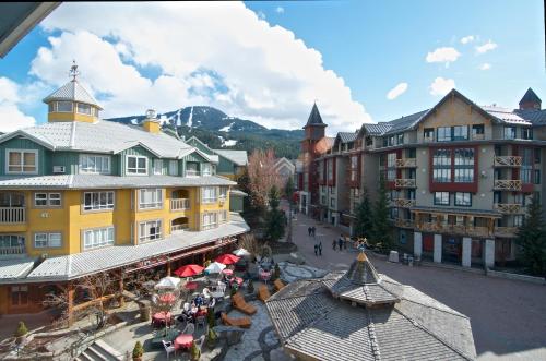 an overhead view of a town with buildings and tables at Whistler Blackcomb Vacation Rentals - Village North in Whistler