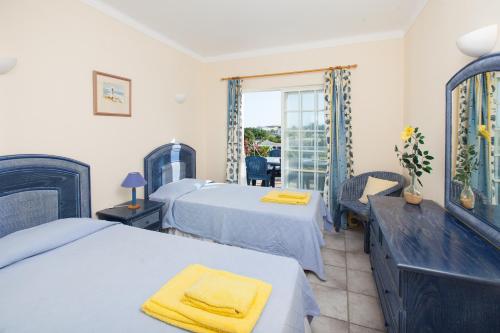 Ένα ή περισσότερα κρεβάτια σε δωμάτιο στο Quinta do Rosal