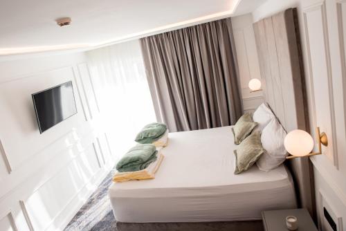 Cama o camas de una habitación en Hotel Krilo