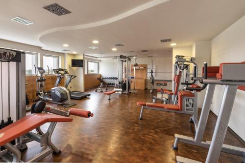 a gym with several treadmills and cardio machines at Valbusenda Hotel Bodega & Spa in Toro