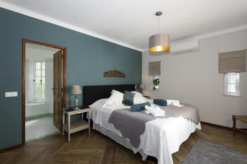 Ένα ή περισσότερα κρεβάτια σε δωμάτιο στο Quinta do Rosal