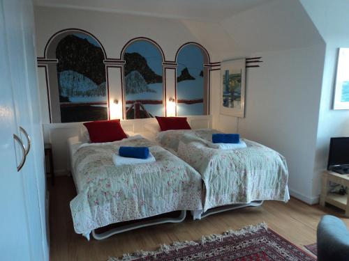 Postel nebo postele na pokoji v ubytování Guldbjerghus B&B