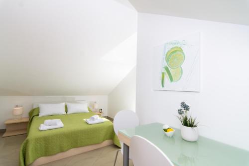 Cama o camas de una habitación en Apartments Rici