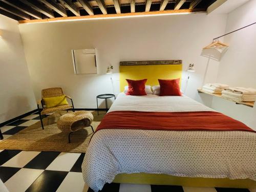 מיטה או מיטות בחדר ב-El cobertizo de Jimena y Candela - PARKING GRATIS