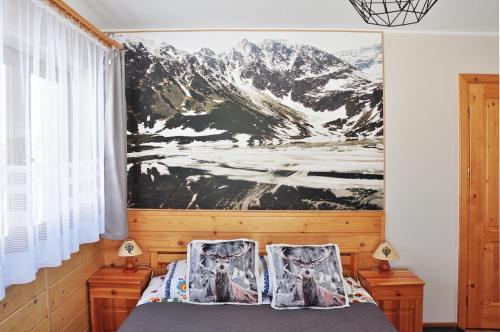 Posteľ alebo postele v izbe v ubytovaní Apartamenty JSZI