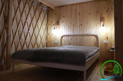 Кровать или кровати в номере FORGLAMP
