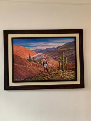 a picture of a painting of a man in a desert at Departamento Centro Jujuy 2 in San Salvador de Jujuy