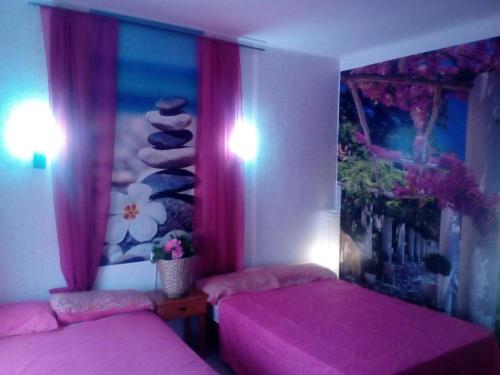 Katil atau katil-katil dalam bilik di CdR Pension Sant Jordi