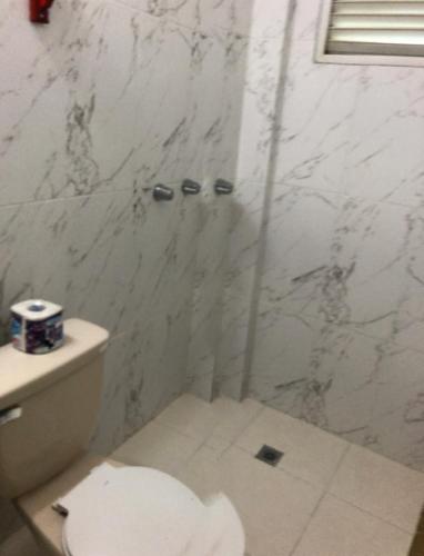 Ein Badezimmer in der Unterkunft REFF HOTEL