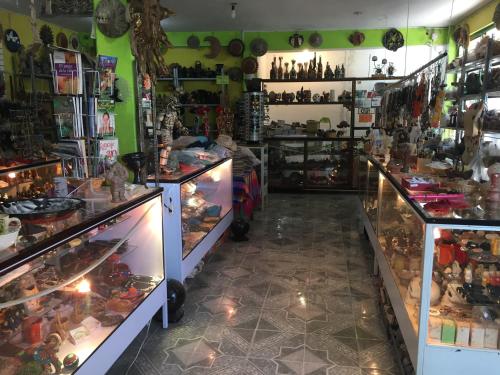 a store with a lot of items on display at Telpochcalli Hotel & Temazcal in San Juan Teotihuacán