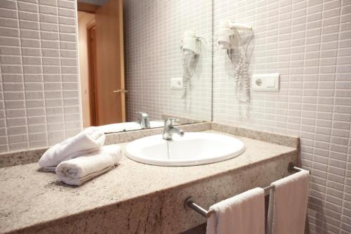 Phòng tắm tại Apartamentos Las Dunas-B