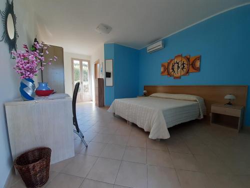 Postel nebo postele na pokoji v ubytování B&B Borgo Minerva