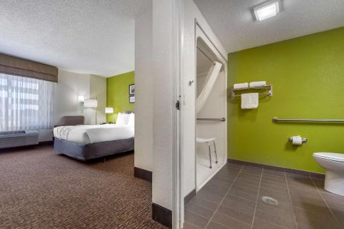 Ένα ή περισσότερα κρεβάτια σε δωμάτιο στο Sleep Inn Grand Island North