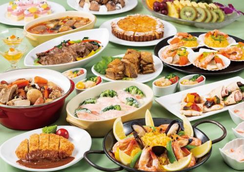 a table with many plates of different types of food at APA Hotel & Resort Ryogoku Eki Tower in Tokyo