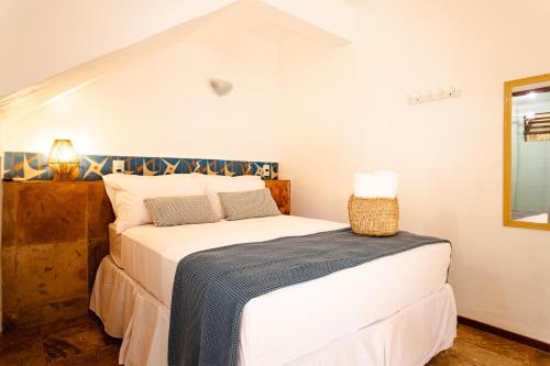 a bedroom with a bed in a room at Jeri Pousada in Jericoacoara