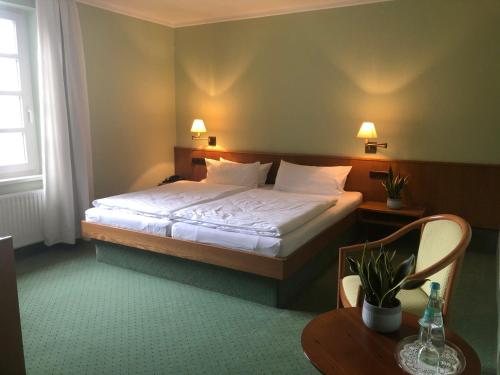 מיטה או מיטות בחדר ב-Gasthaus Block
