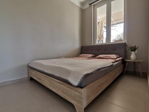 Łóżko lub łóżka w pokoju w obiekcie Fűszerkert vendégház