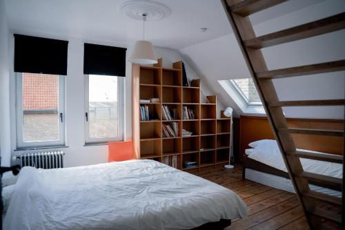 Кровать или кровати в номере Villa Ghysbrecht