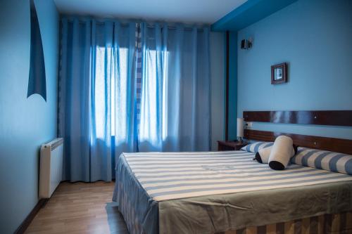 Katil atau katil-katil dalam bilik di Hotel A. G. Porcillan