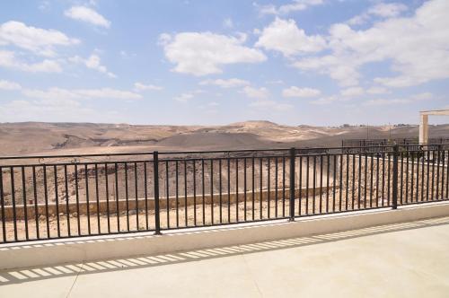 a balcony with a view of the desert at Vastu Dead Sea apartment in Arad